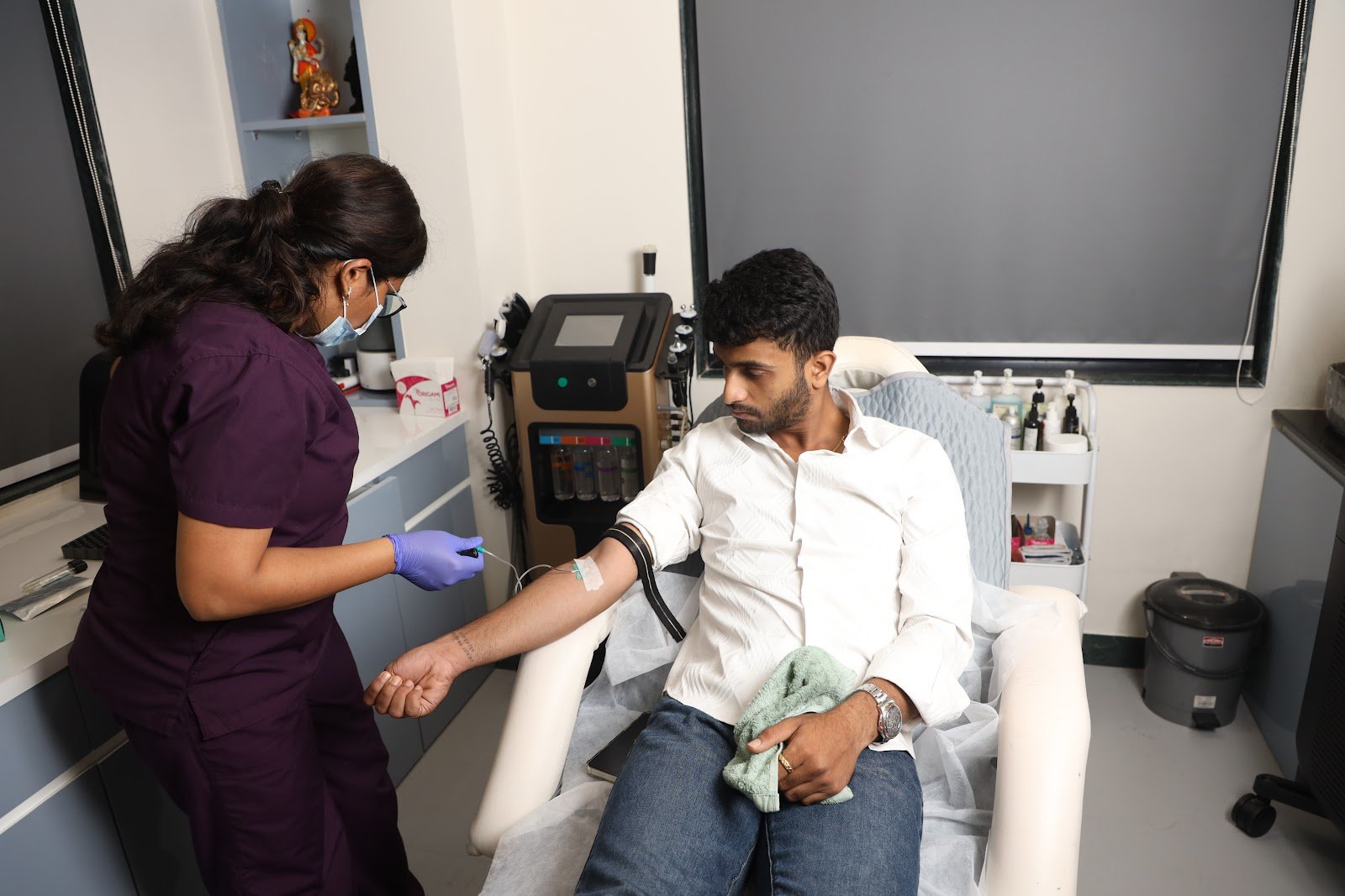 Aesthetic treatment being prepared in the clinic treatment room