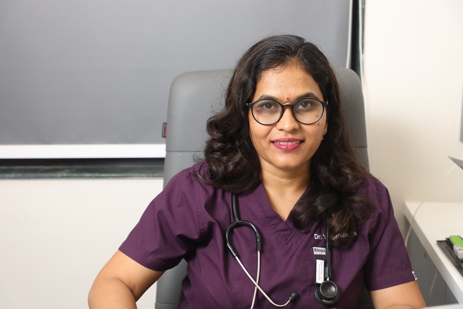 Yuga's Aesthetic Clinic doctor portrait in the consultation room